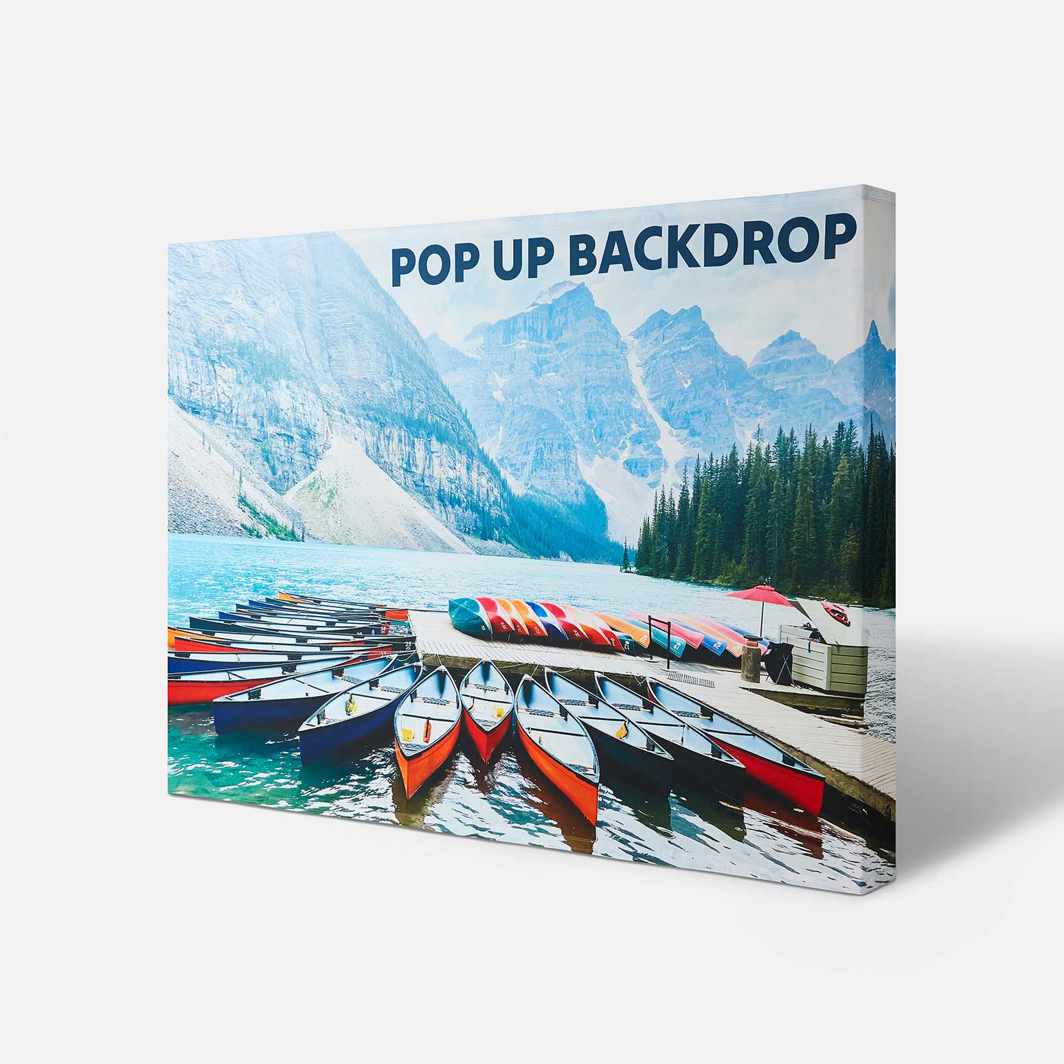 Dark backdrop mockup with white decorative clouds, a red star, and a stylized red sun graphic, set up on a white surface with metal support stand.