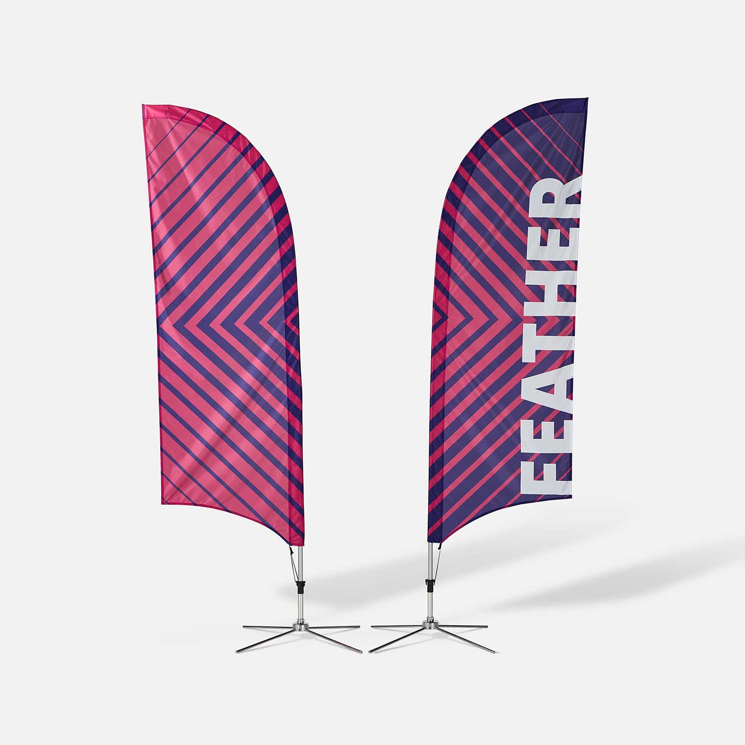 Two custom feather flags with diagonal stripe patterns in pink and purple, one showing the word FEATHER in white letters.