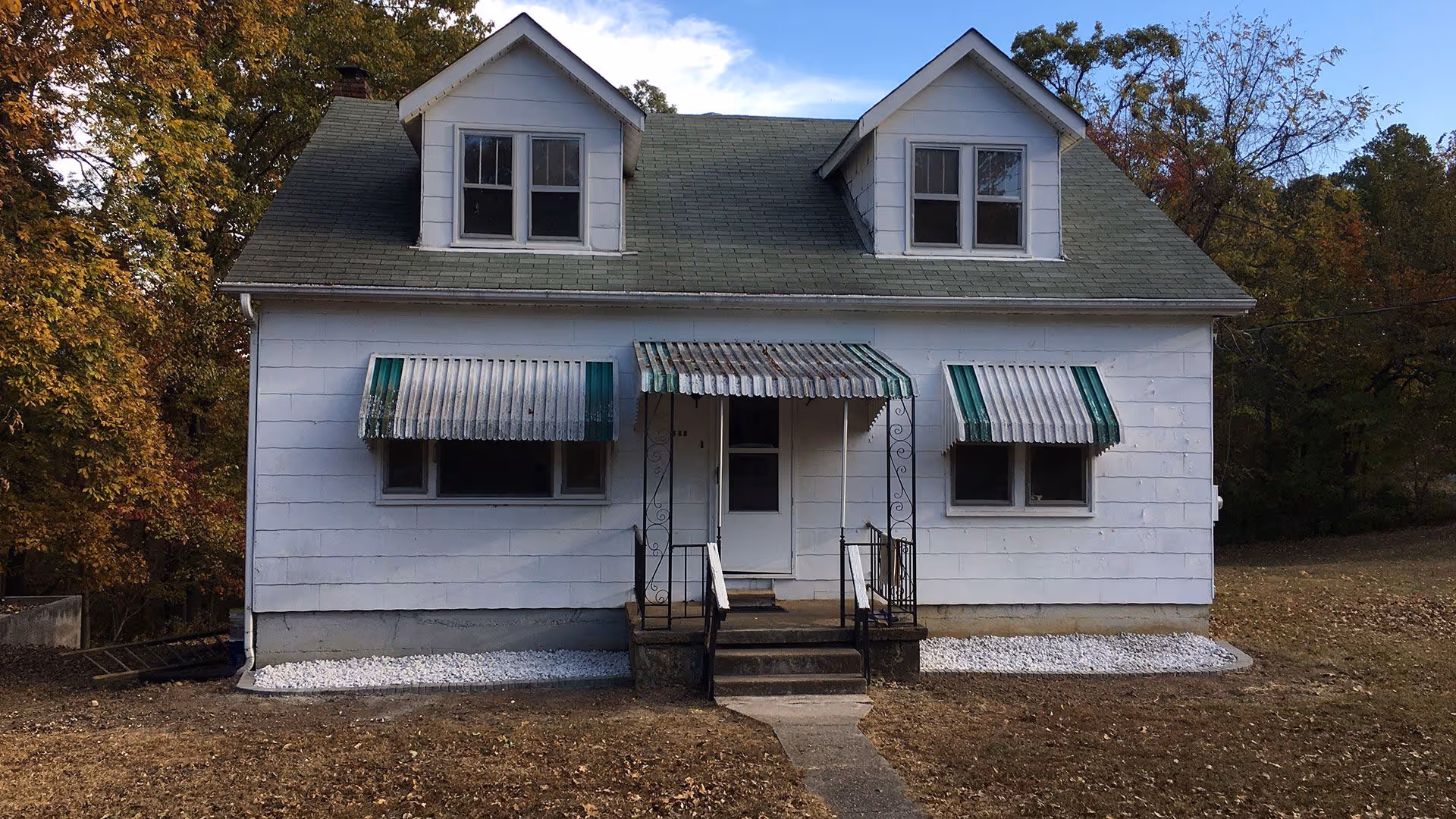 After landscaping – freshly mulched garden beds and trimmed shrubs by Village Grass Lawn Care
