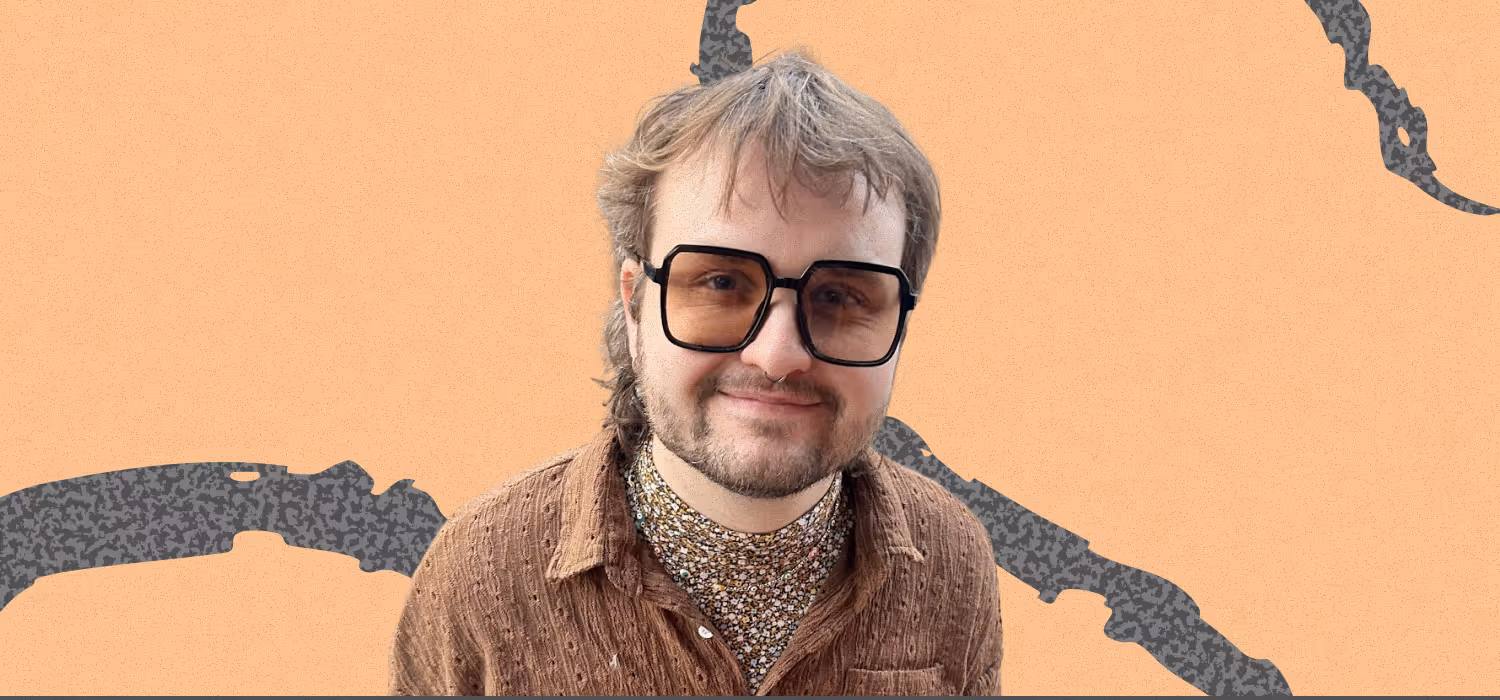 Jay Molloy portrait image with orange background and wavy grey wisp