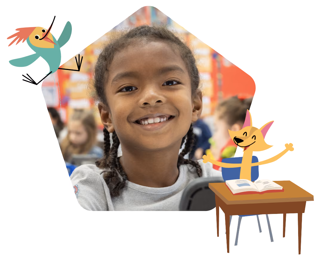 Smiling young student with braided hair in classroom with colorful background and cartoon characters.