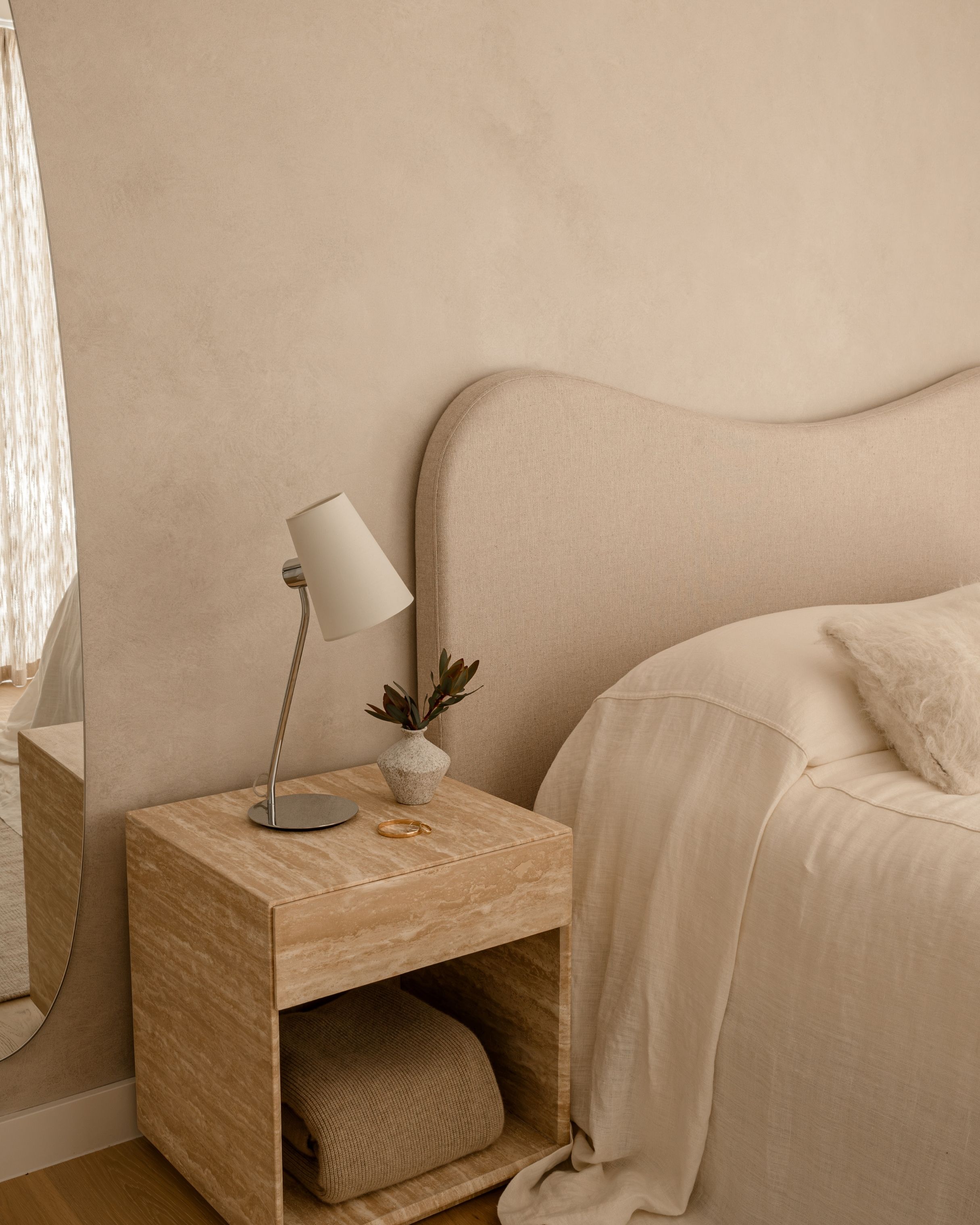 Textured plaster wall with soft shadow