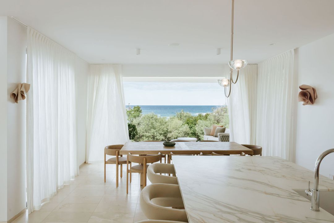 Kitchen renovation with stone benchtops and custom timber joinery on Orient Drive, Sunrise Beach