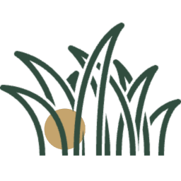 Stylized image of green grass blades with a tan circle behind them resembling the sun.
