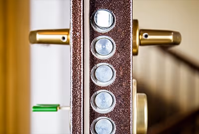 A heavy-duty commercial door lock with multiple latch bolts. Tasmanian Mobile Locksmith can upgrade security door locks for businesses across Hobart.