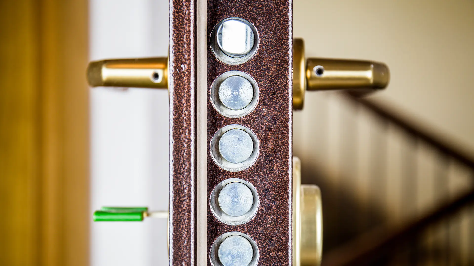 A heavy-duty commercial door lock with multiple latch bolts. Tasmanian Mobile Locksmith can upgrade security door locks for businesses across Hobart.