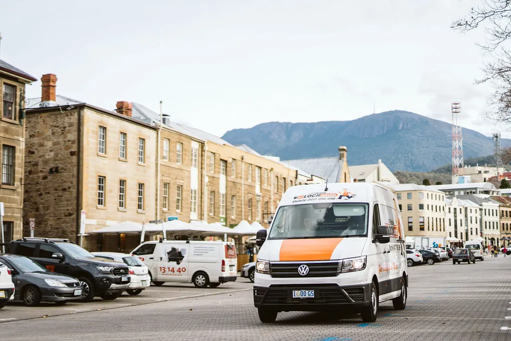 One of our vans, travelling down a main street in Hobart. We rekey and change locks for clients all around Hobart.