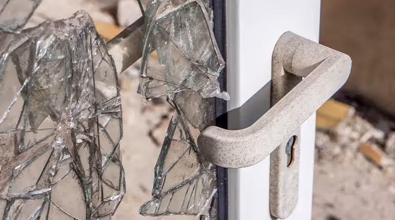 A shattered glass door, caused by burglars looking to break into a home.