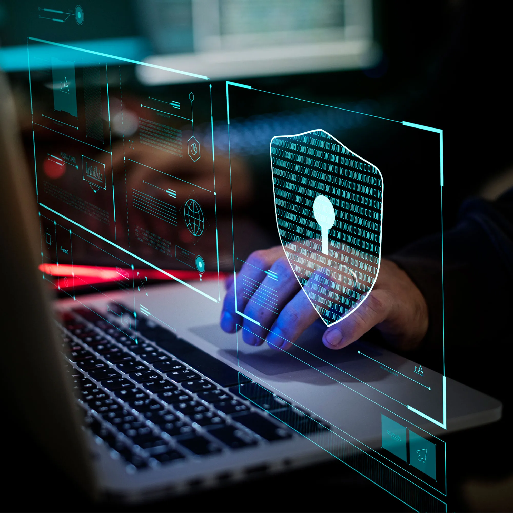 Man typing on a computer