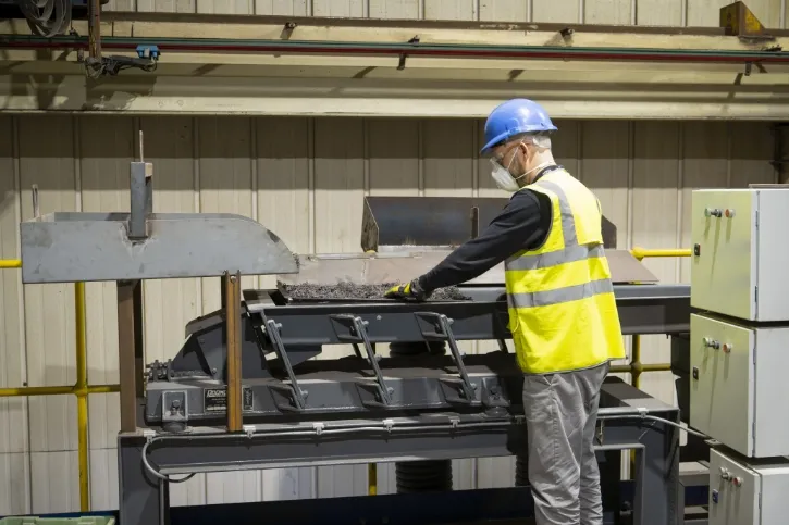 Man using metal separation machine