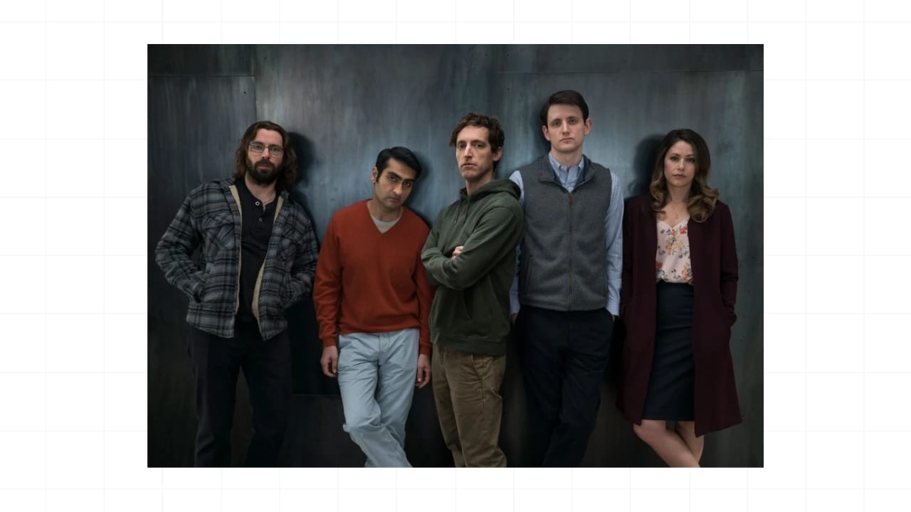 Promotional image of the five main characters from the TV show Silicon Valley standing side by side against a dark backdrop.