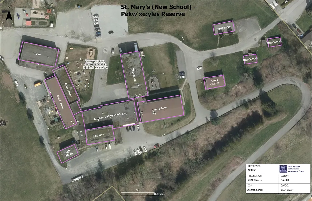 Aerial map of St. Mary’s New School on Pekw’xe:yles Reserve showing labeled buildings including Gym, Classrooms, Boys dorm, Girls dorm, Kitchen-Cafeteria- offices, Chapel, Staff offices, Nun's quarter, and Residences, with roads and parking areas.