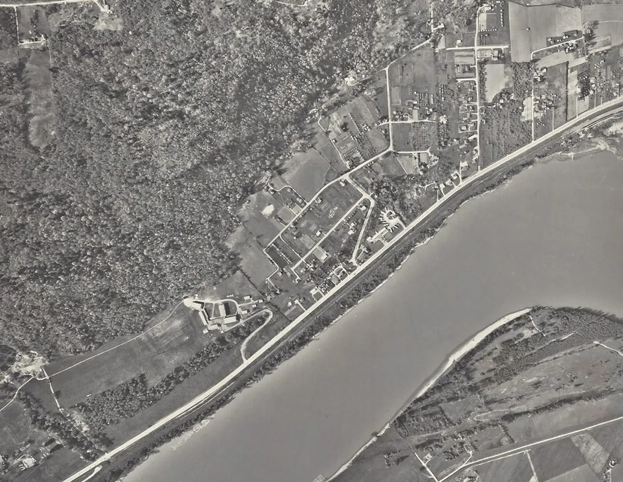 An aerial view of a river and a city.