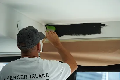 Painter applying a smooth interior finish coat — Mercer Island Painting