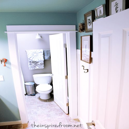 Newly renovated bathroom with turquoise walls.