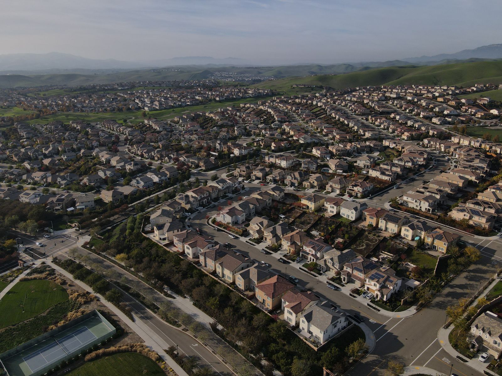 Aerial shot of houses in a residential area representing rental growth markets