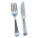 Une fourchette et un couteau en acier inoxydable avec un reflet brillant.