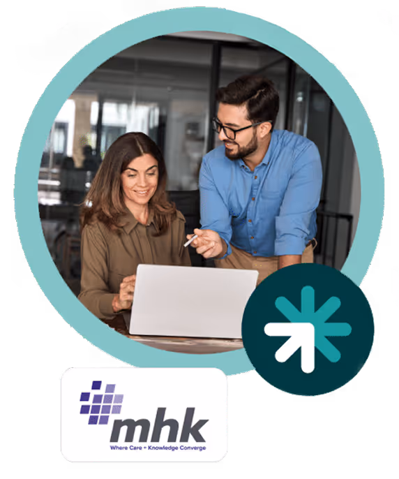 Colleagues looking at laptop above MHK logo.