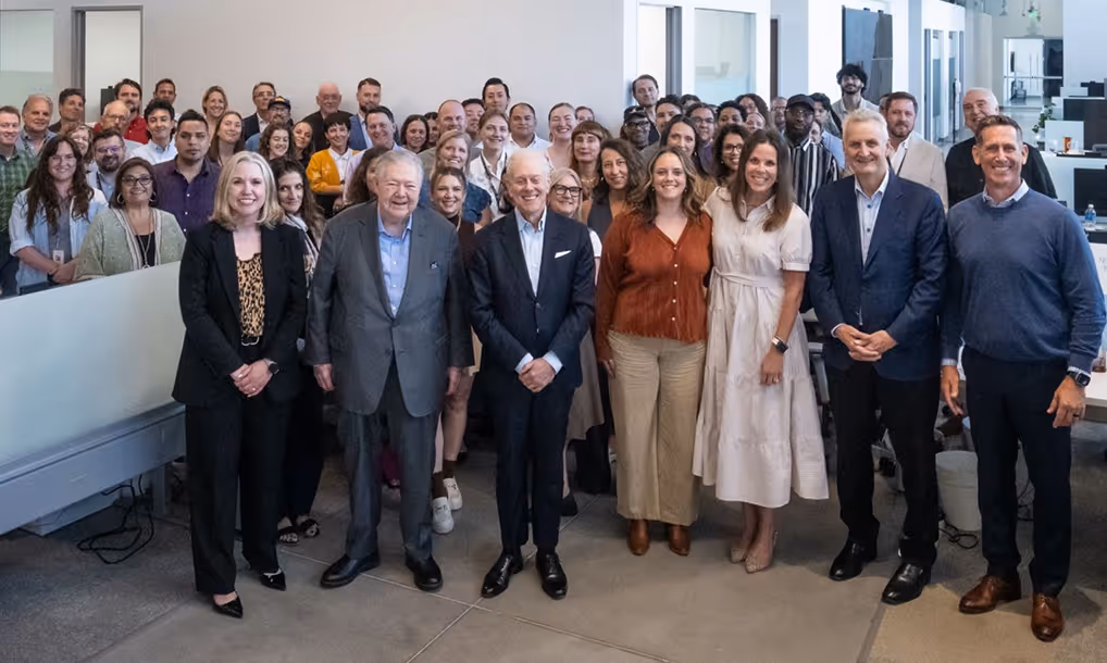 Frank A. Bennack, Steve Swartz and Jeff Johnson pose for photo with Austin American-Statesman colleagues. 