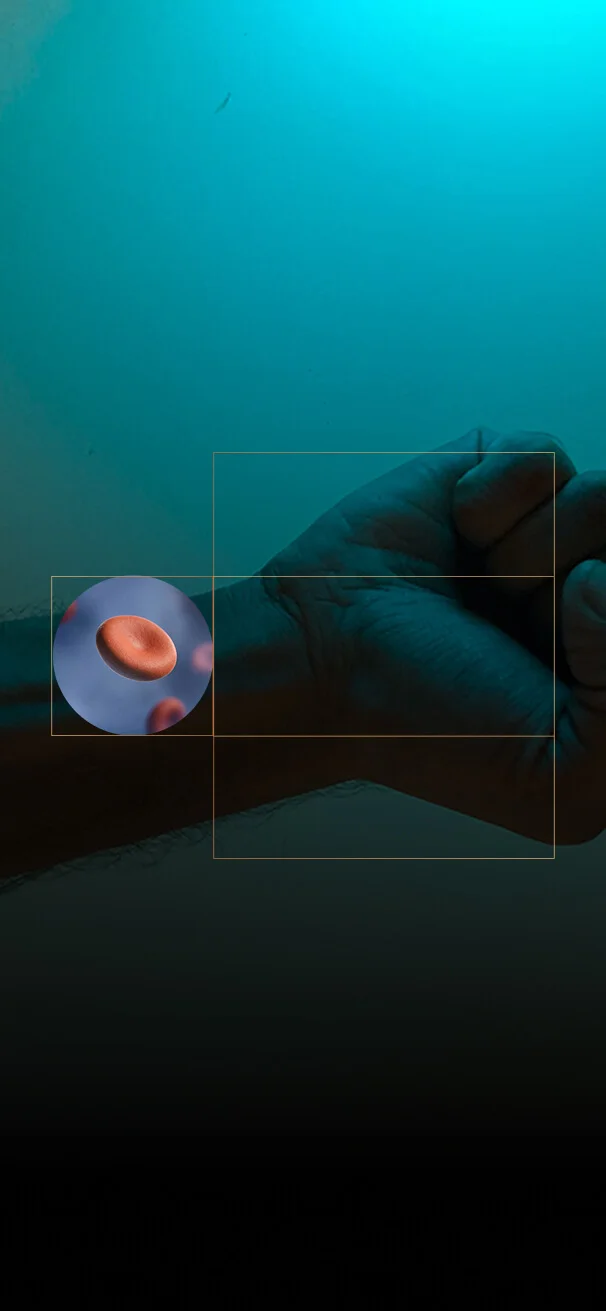 Close-up of a clenched fist against a teal background with an inset image of a red blood cell.
