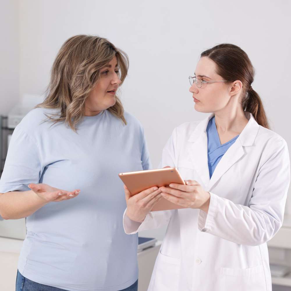 Provider offering healthy lifestyle and wellness coaching as part of a weight management program at Fanous Medspa in Charlotte, North Carolina.