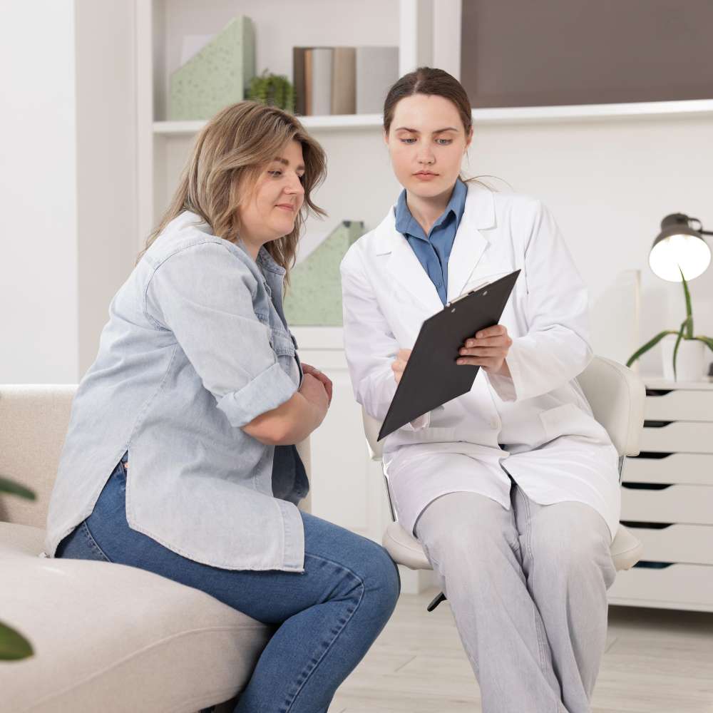 Client receiving a supportive, personalized weight management consultation at Fanous Medspa in Charlotte, NC.