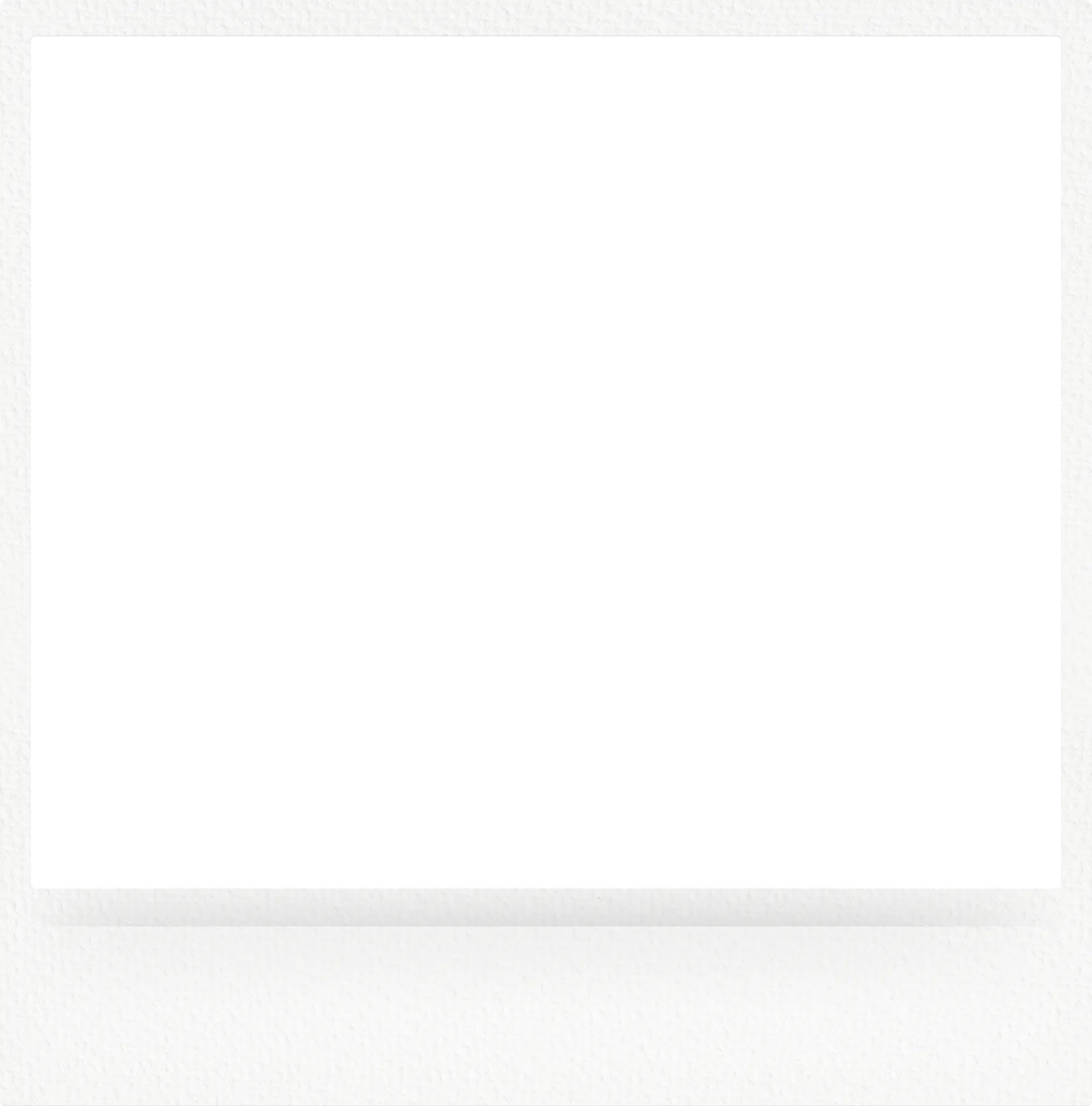 Empty black film frame with white border on textured white background.