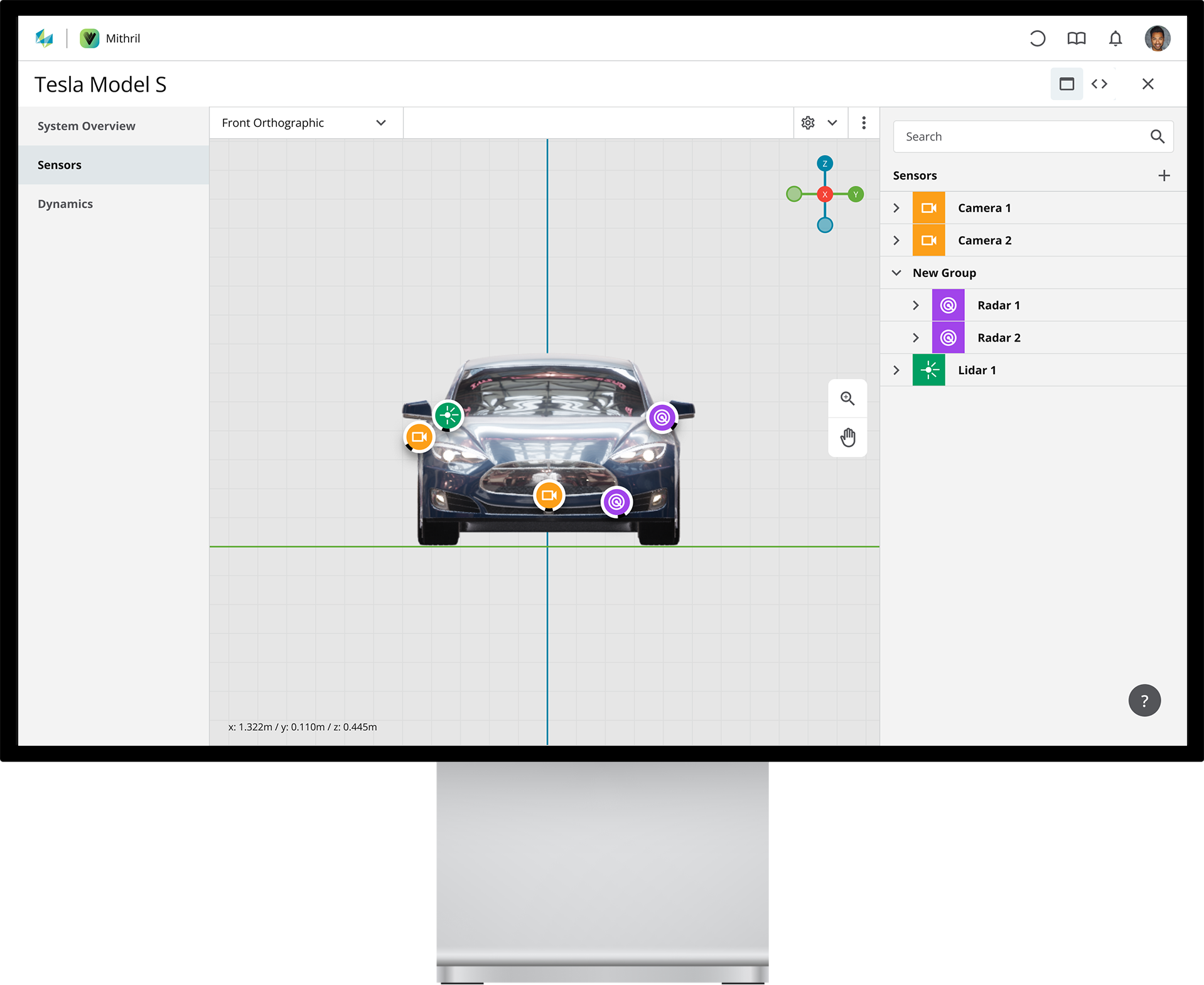 Bildschirm mit Standfuß zeigt Vorderansicht der Sensoren am Automodell.