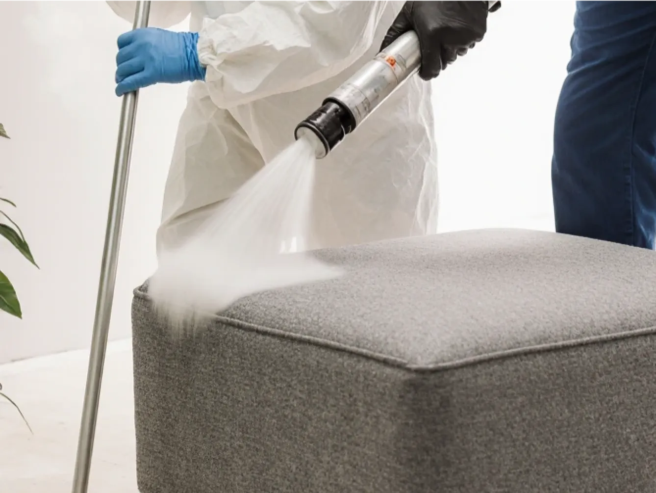 Steam cleaning an upholstered ottoman