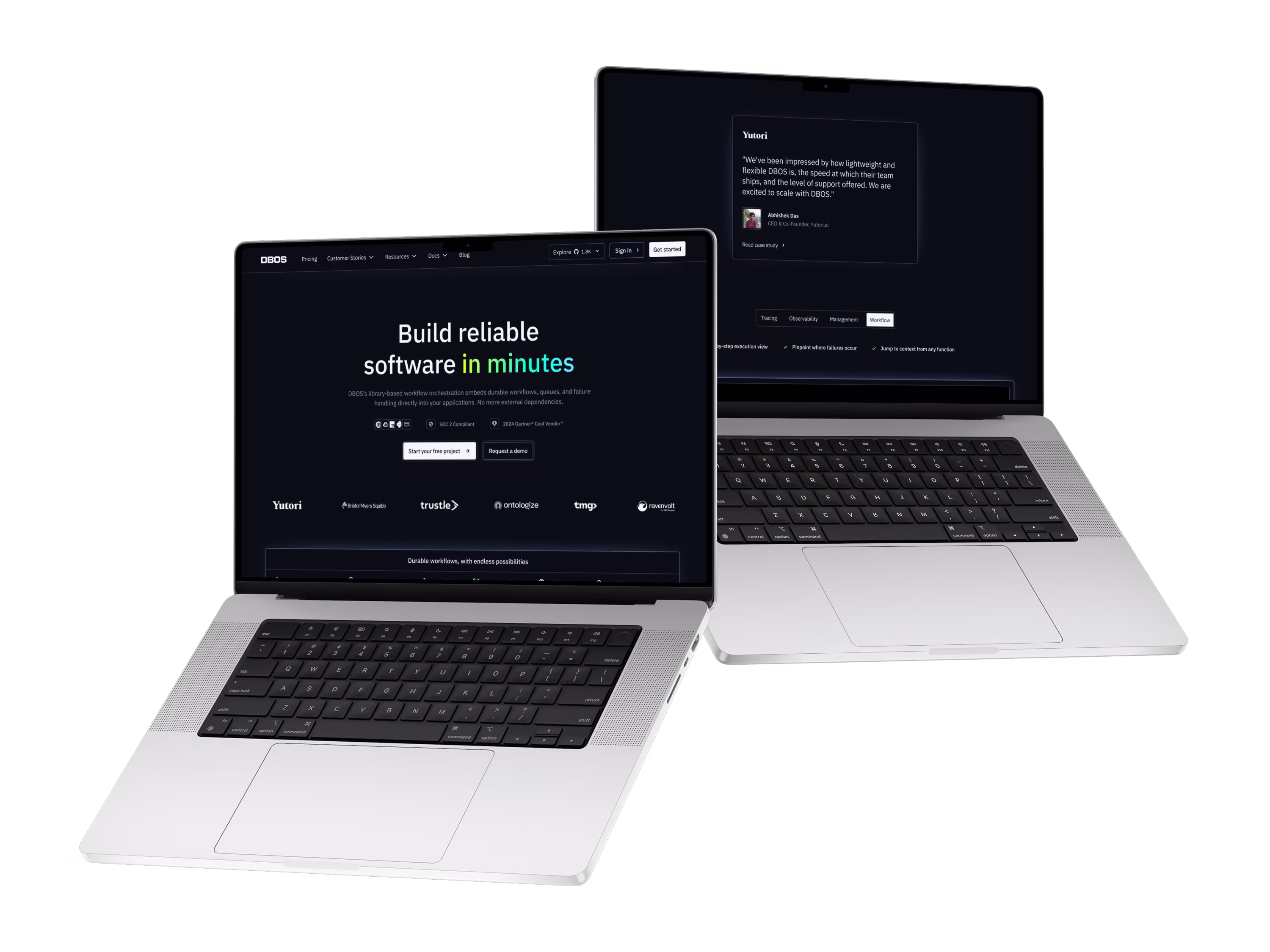 DBOS homepage shown across two laptops.