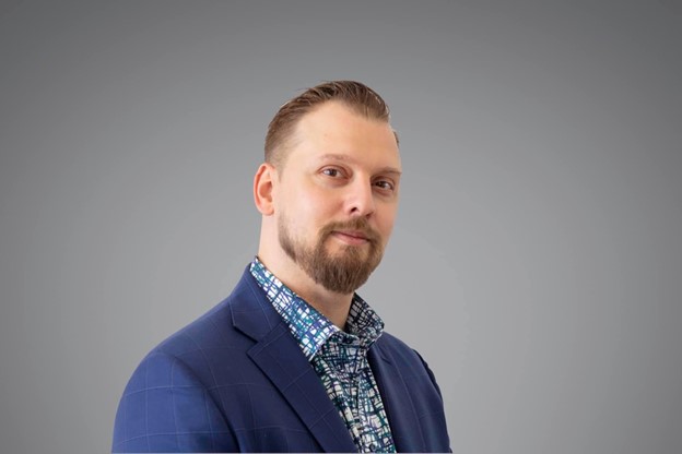 a man in a blue suit