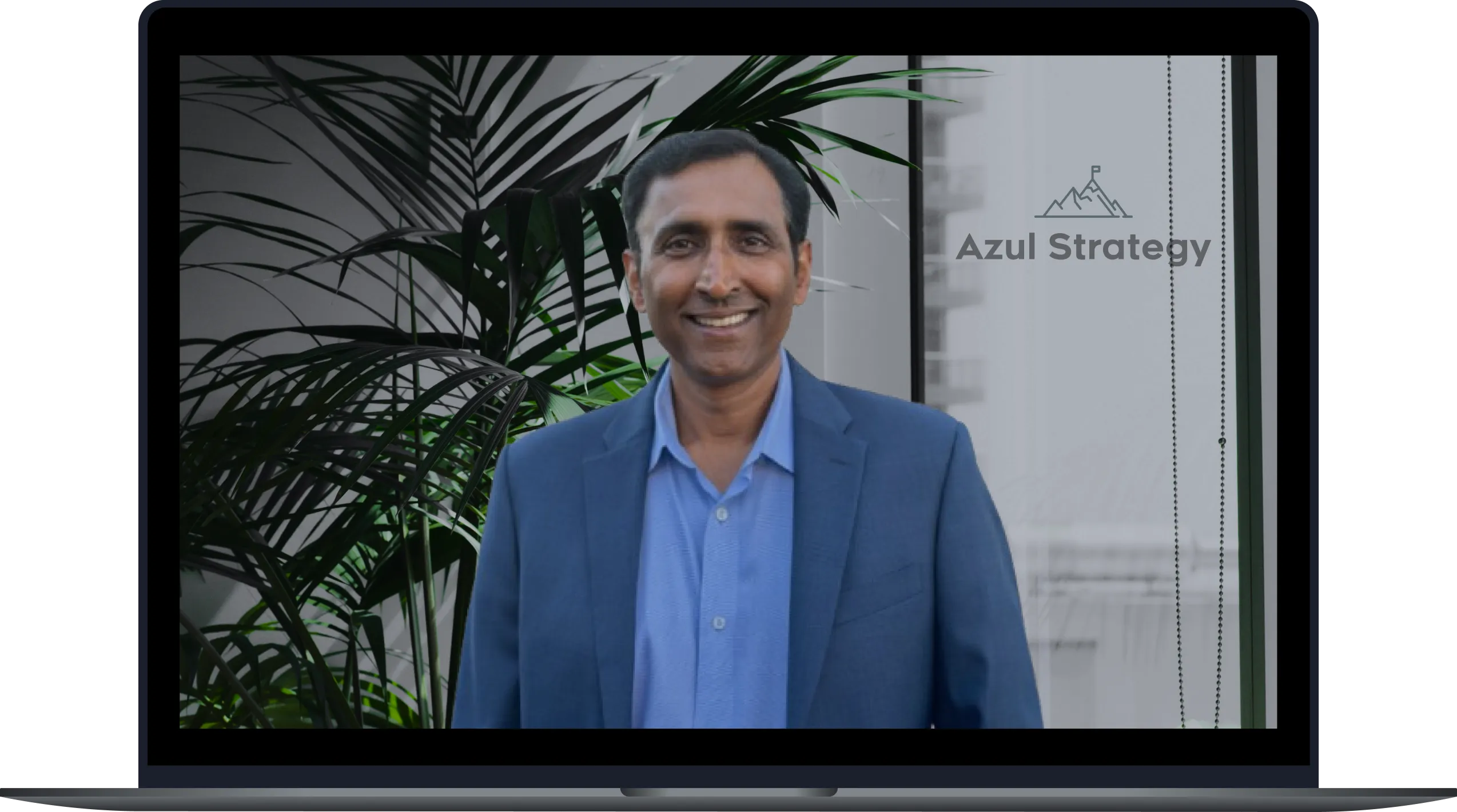 Laptop with Vinay Murthy in screen