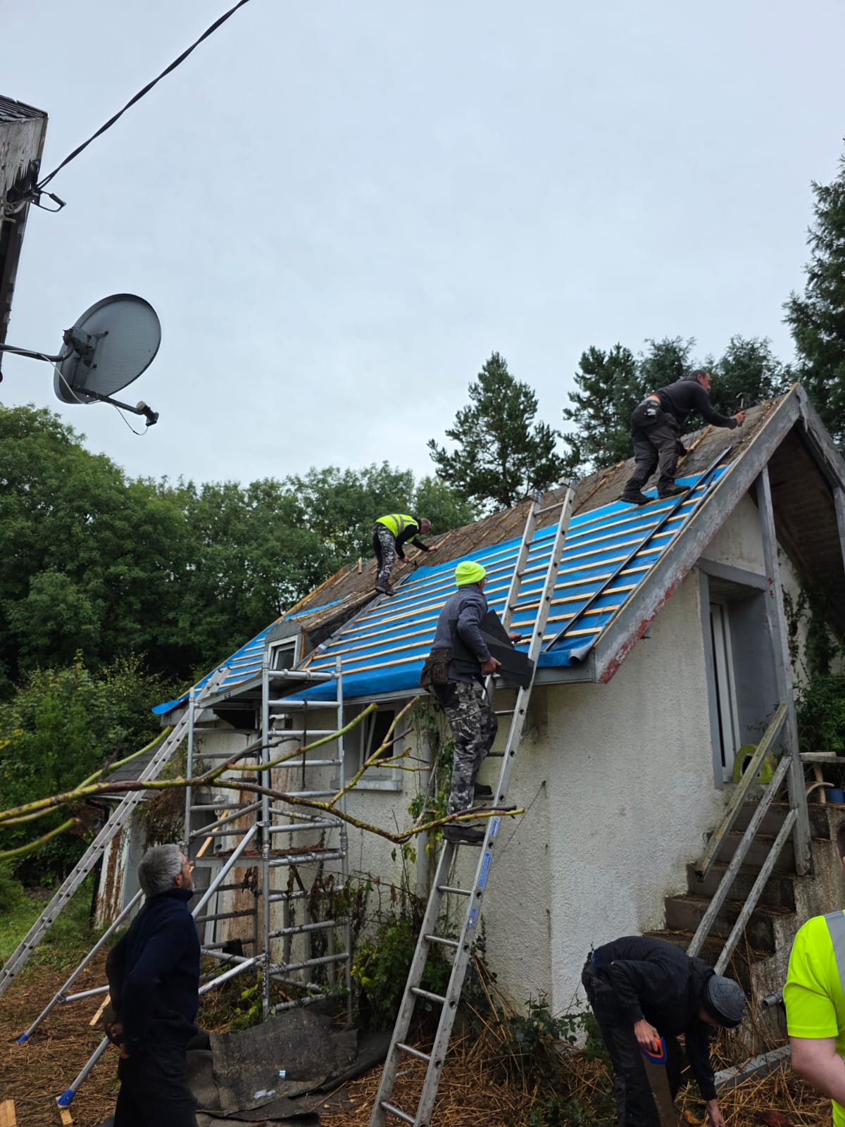 roofers on roof top