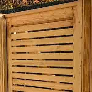 Slatted timber pedestrian gate with angled privacy design, installed between posts.