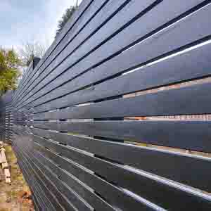 Angled close-up of black horizontal slats showing sleek, contemporary lines.