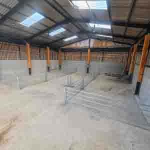 Timber post and rail entrance gate at a commercial property by Green Leaves Fencing and Gates in East Grinstead.