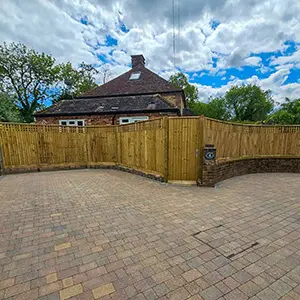 Closeboard timber fence with DuraPost steel posts along garden boundary, installed by Green Leaves Fencing & Gates in East Grinstead.