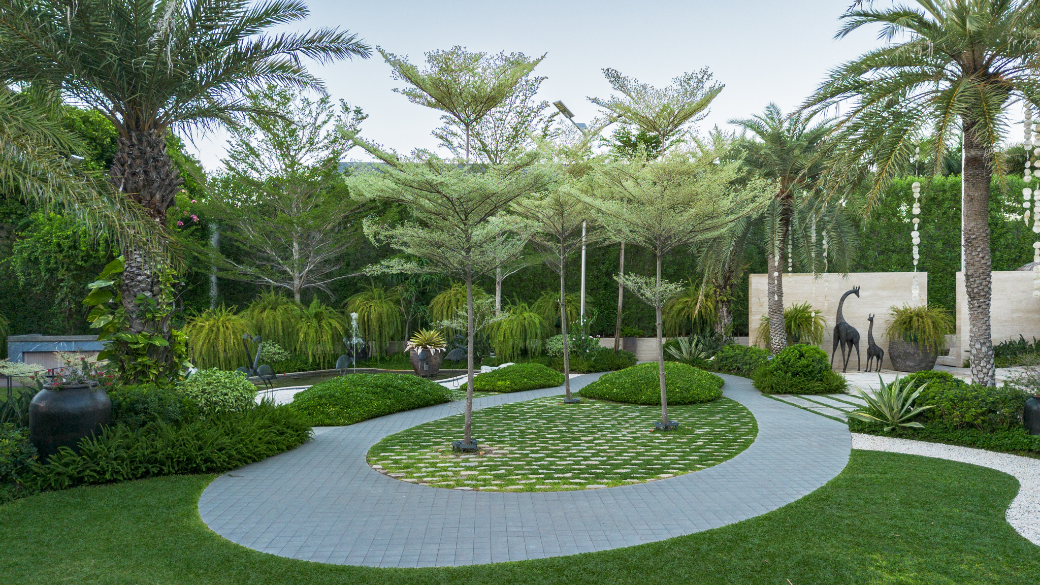 Lexus House — The design emphasizes organic forms throughout the lanscape, from meandering pathwalks to lush, tropical planting so homeowners and guests feel one with nature.
