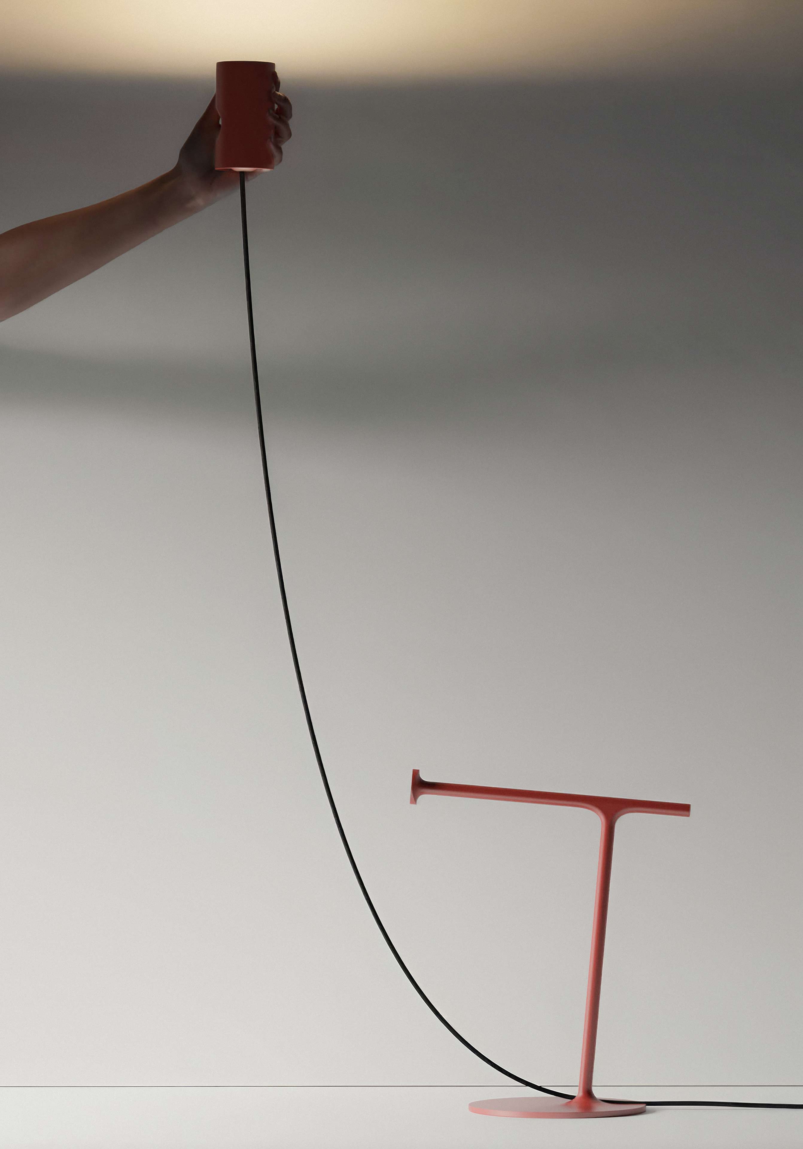 Person holding Grab Lamp, pointing it towards ceiling