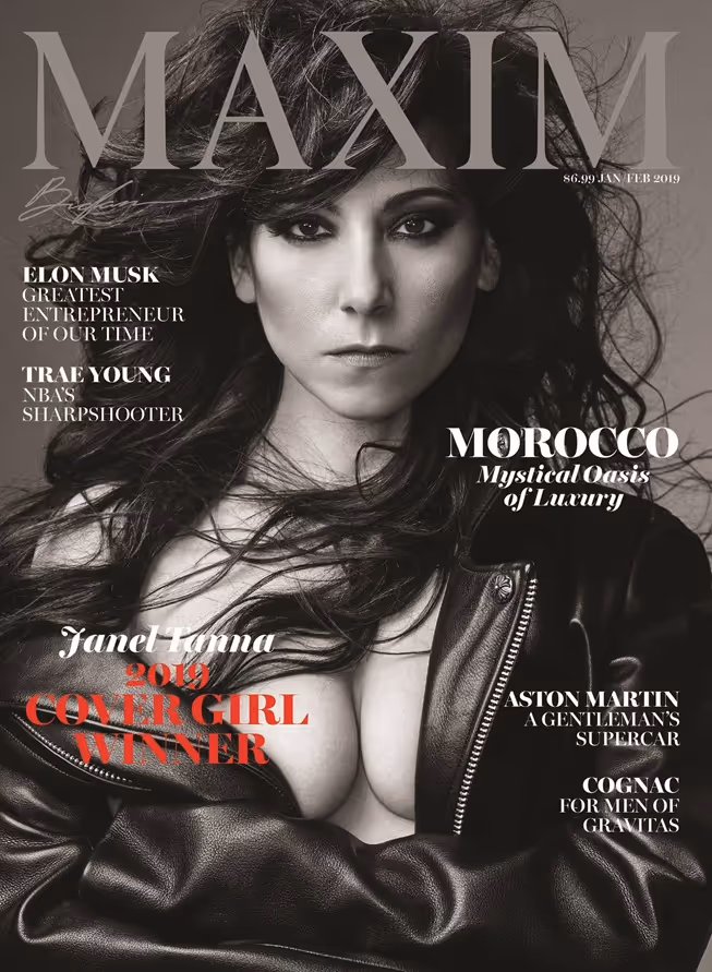 Black and white cover of Maxim magazine featuring a woman with long dark hair wearing a leather jacket, titled 2019 Cover Girl Winner Janet Fonna.