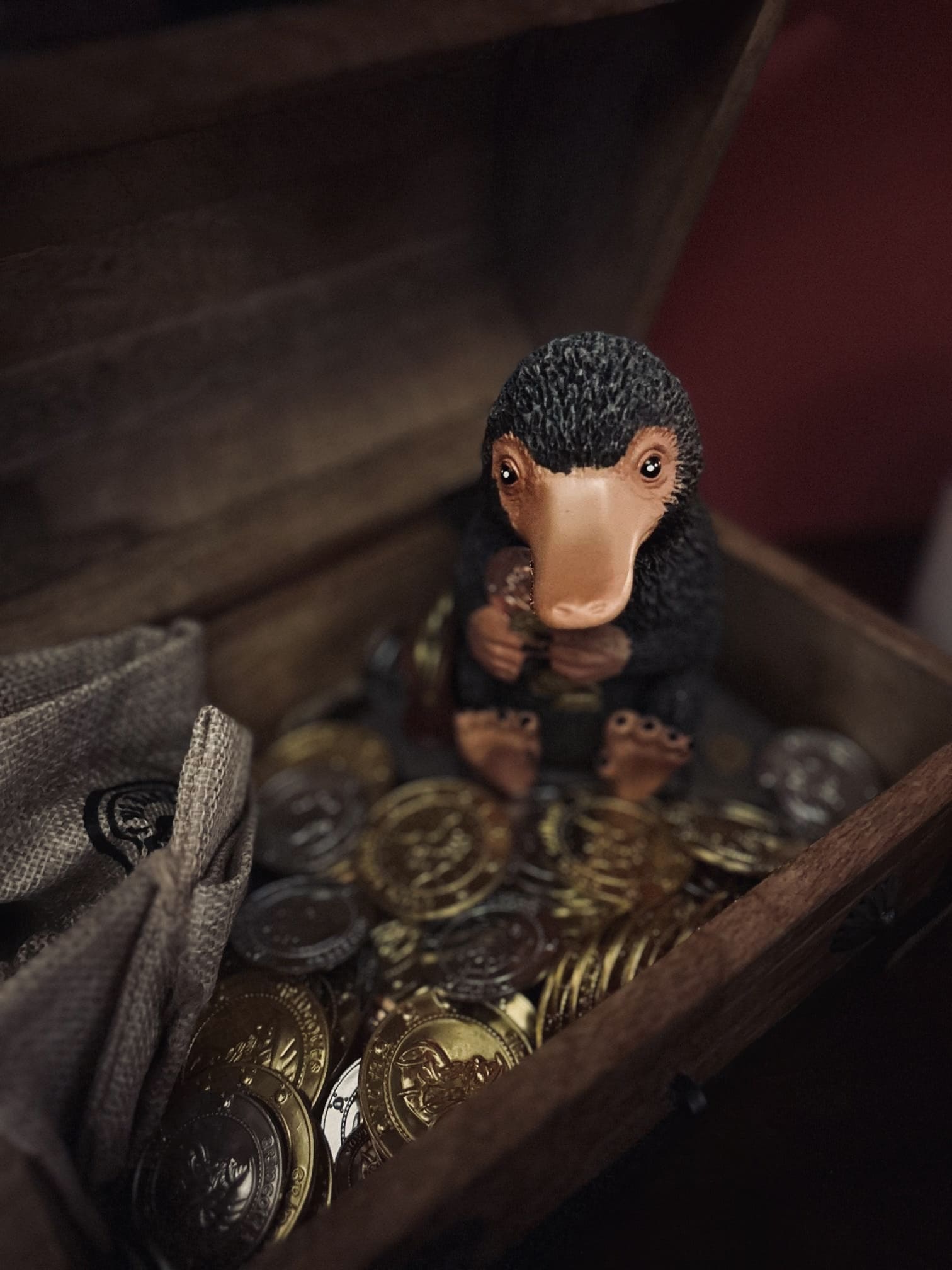 Un niffleur dans un coffre de pièces d'or