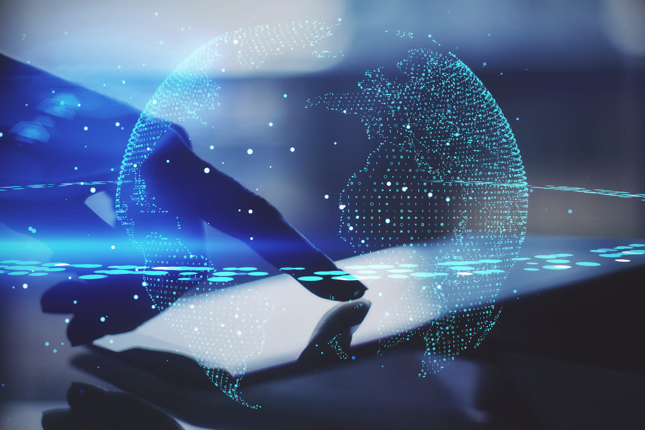 Hand interacting with a digital touchscreen displaying a glowing holographic globe and network connections