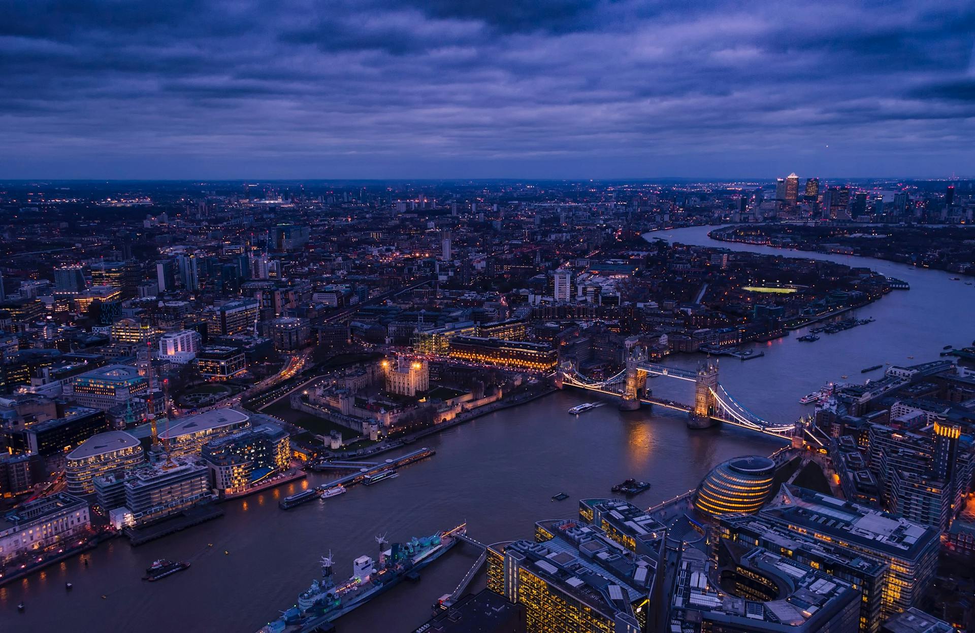 3. GBM Securities London office overlooking the financial district skyline with the Tower Bridge