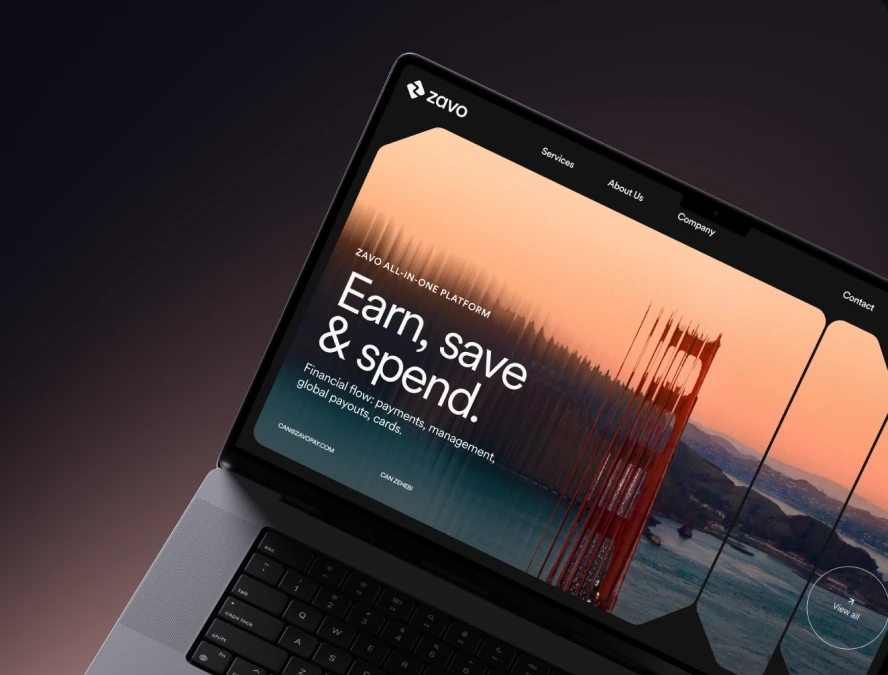 Laptop with the Zavo website open on the screen.