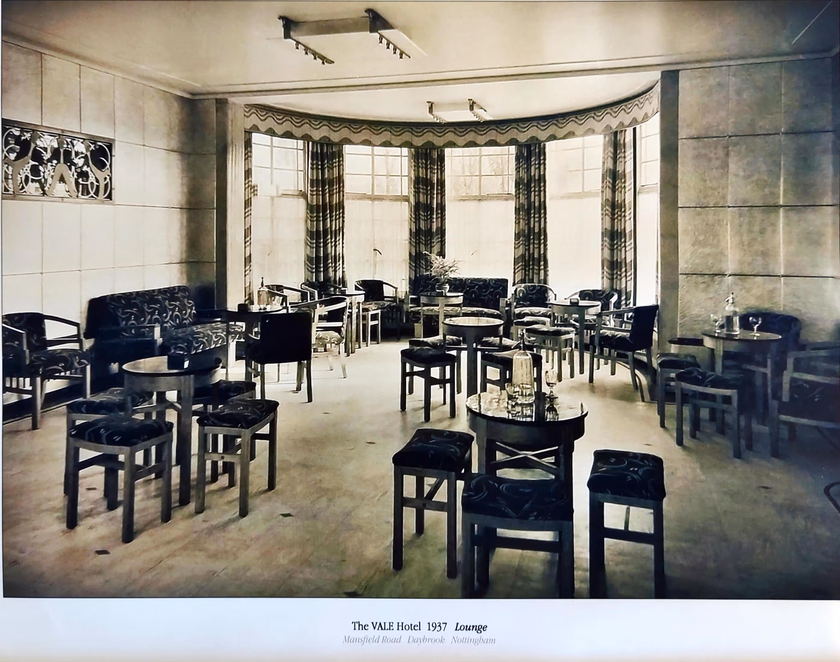 An old photo of The Vale's lounge room.