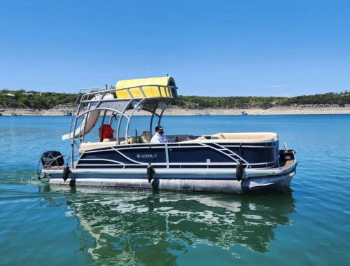 Double decker pontoon boat with slide