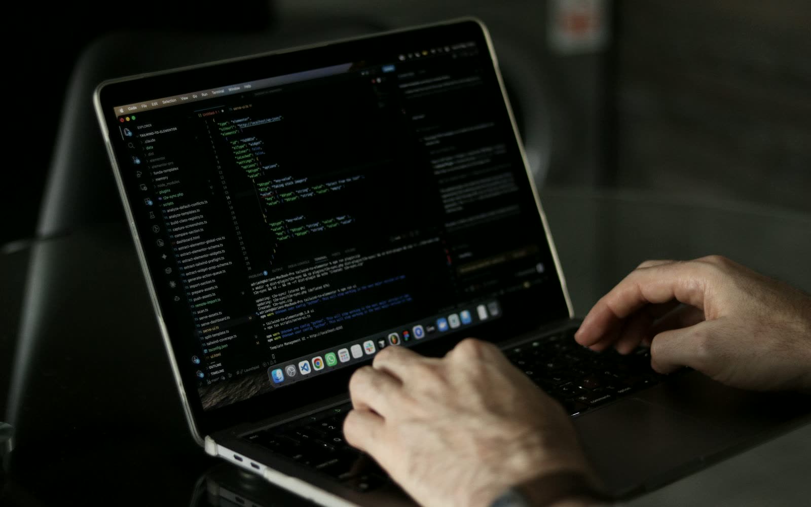 Developer building a website on a laptop