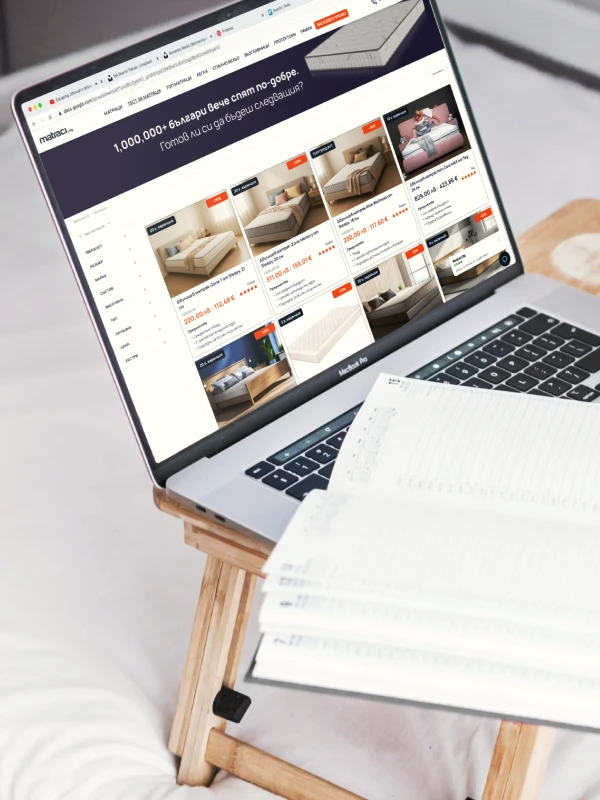 A Macbook with the matraci.bg e-commerce website open