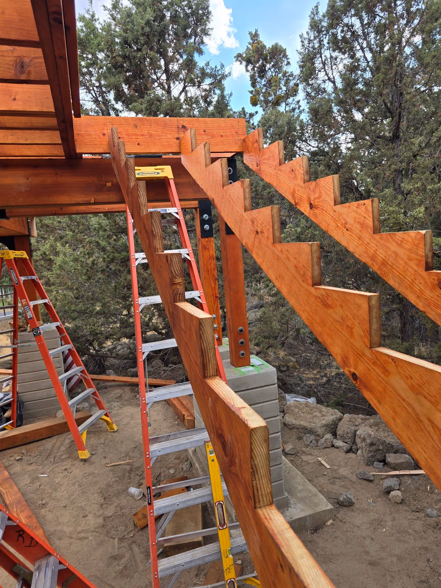 A wooden structure with a ladder attached to it.