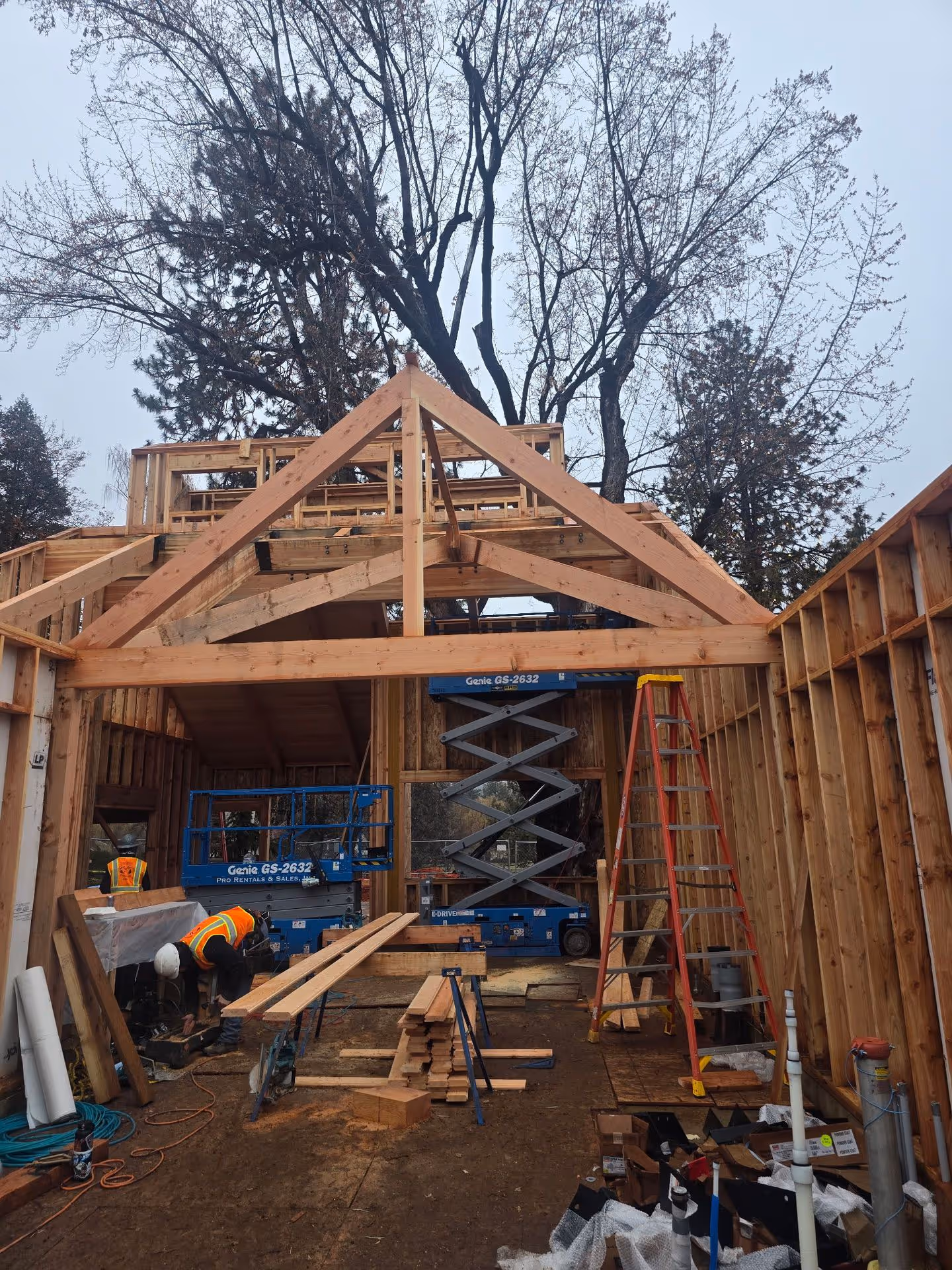 A house being built with wooden framing.